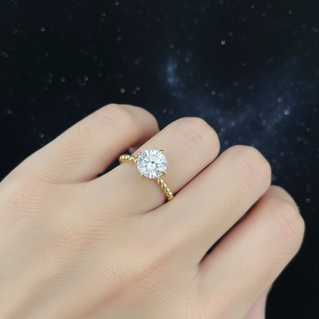 Hand wearing beaded band solitaire